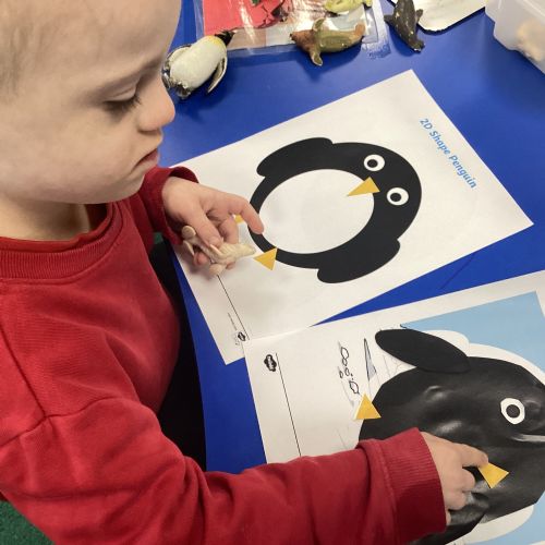 Exploring animals that live in Antartica and playing in homemade snow!